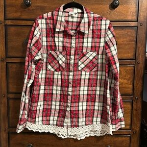 Shyanne women’s button down shirt
With lace trim on the bottom